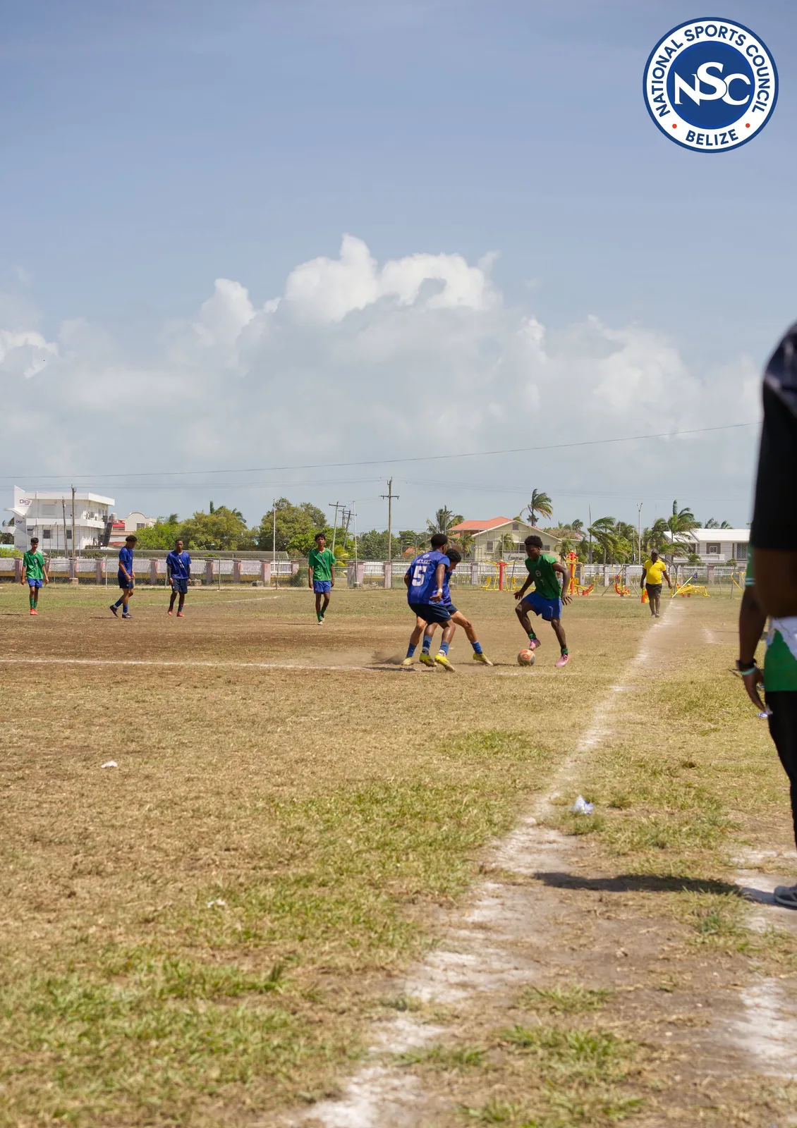 Youth soccer players challenging for the ball on an outdoor field at the NSC Super Nationals